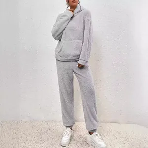 Comfortable grey fleece two-piece loungewear set with hoodie and matching sweatpants