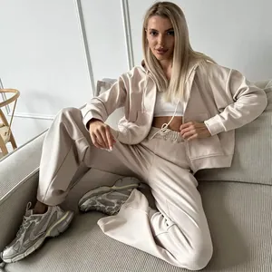 Women's stylish beige solid color zip-up hoodie and wide-leg drawstring pants two-piece set