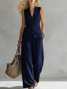 Elegante conjunto de chaleco sin mangas azul marino y pantalones de lino de pierna ancha