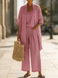 Detail of pink 3-piece linen leisure set with wide-leg trousers for summer vacation