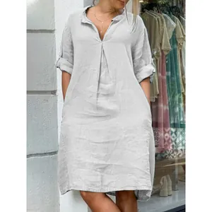 Casual V-neck pleated linen-style midi dress in light grey for women's summer wear.