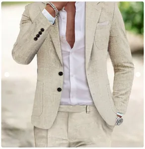 Close-up detail of a men's light khaki linen suit jacket and trousers set on model