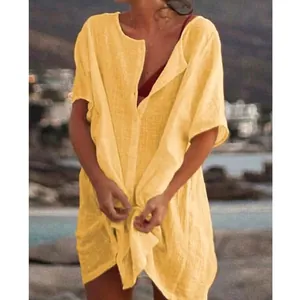 Loose bright yellow mid-length short sleeve tunic shirt beach cover up for casual summer