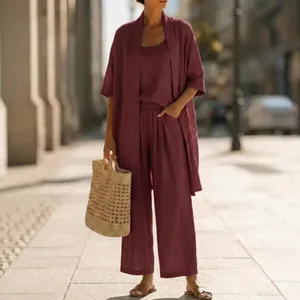 Elegant solid dark burgundy three-piece linen set featuring cardigan and wide-leg pants