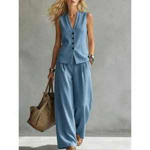 Elegante conjunto de dos piezas de lino azul con chaleco sin mangas y pantalón ancho