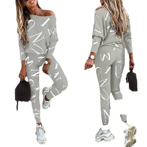 Conjunto casual de dos piezas para mujer con top de manga larga y pantalón estampado