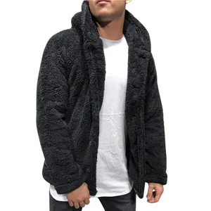 Detail of black men's fleece hooded jacket showing textured sherpa fabric