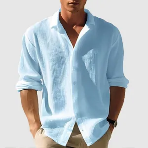 Close-up detail of light blue men's waffle knit long sleeve casual button down shirt