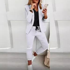 Women's chic white two-piece blazer and drawstring pants set for casual office wear