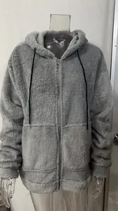 Detailed view of a men's grey plush hooded zip-up jacket showing fuzzy texture