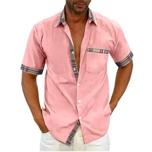 Detail view of men's pink short-sleeve casual shirt with plaid collar and cuff trims