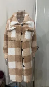 Detailed close-up of a long plaid sherpa fleece coat with a turn-down collar and black buttons