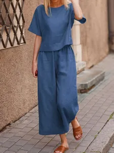 Casual blue linen-style two-piece set with short sleeve top and wide leg pants