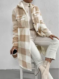 Detailed view of women's long plaid sherpa coat with soft fleece texture and lapel.
