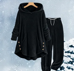 Women's black fleece loungewear set with hooded top and pants featuring button details