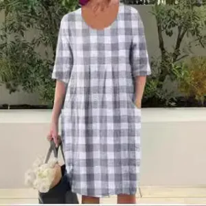 Grey and white plaid gingham dress with round neck and side pockets