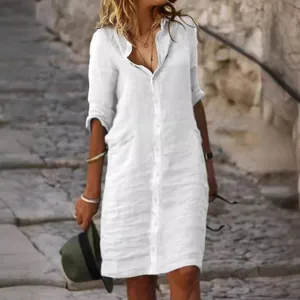 White loose cotton linen shirt dress with lapel collar and buttons for a summer look