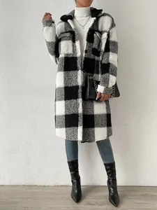 Full-length view of a stylish black and white plaid sherpa long coat for women outfit