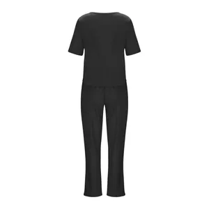 Rückansicht eines schwarzen Damen-Sets aus Baumwolle und Leinen mit Oberteil und weiter Hose