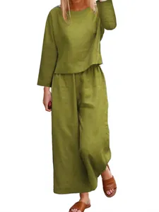 Full view of casual green two-piece linen-style loose shirt and wide-leg trousers set