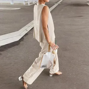 Casual beige two-piece set with sleeveless top and wide-leg trousers for women