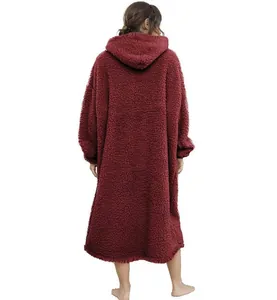 Back view of a long burgundy sherpa wearable hooded blanket for home lounging comfort