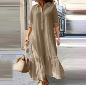 Elegant long khaki cotton linen shirt dress with buttons and a flowing ruffled hemline