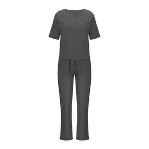 Elegantes dunkelgraues Baumwoll-Leinen-Set mit kurzärmeligem Oberteil und weiter Hose.