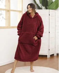 Cozy dark red oversized fleece wearable blanket with a warm hood and large front pocket