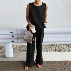 Fashionable black two-piece summer set featuring sleeveless top and loose wide-leg trousers
