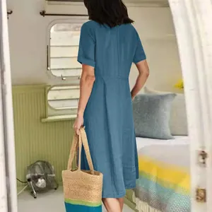 Elegant blue cotton linen midi dress with short sleeves and high waist for summer wear.