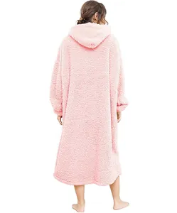 Detailed back view of a long pink oversized sherpa hooded wearable blanket for winter warmth
