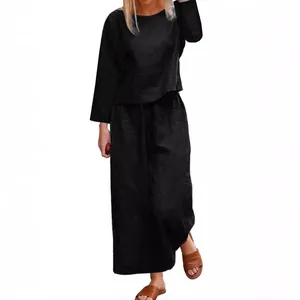Elegant black plus size two-piece set with loose long-sleeve shirt and wide-leg pants