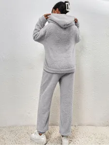 Back view of a cozy grey fuzzy two-piece loungewear set for women, perfect for winter.