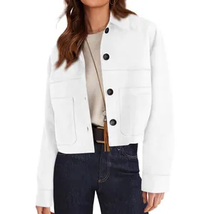Stylish women's short faux suede jacket in white with large black buttons.
