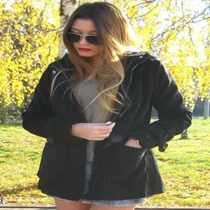 Stylish women's black hooded duffle coat featuring classic toggle buttons for autumn.
