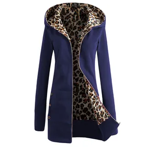 Detailed view of blue hooded jacket showing soft fleece leopard print interior lining