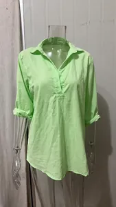 Casual loose-fitting long sleeve linen shirt with V-neck in vibrant lime green shade