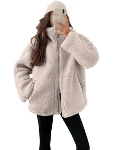Gezellige oversized beige sherpa fleece jas met hoge kraag en dubbele ritssluiting