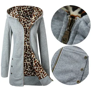 Detail view of gray women's hooded sweatshirt with leopard print fleece lining
