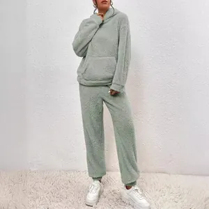 Cozy sage green fuzzy two-piece lounge set with a hooded sweatshirt and matching pants