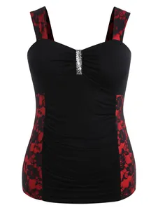 Detailed view of women's black camisole featuring red lace side panels and sequins