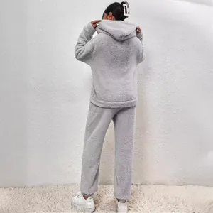 Cozy grey fuzzy two-piece loungewear set for women with hoodie and matching pants