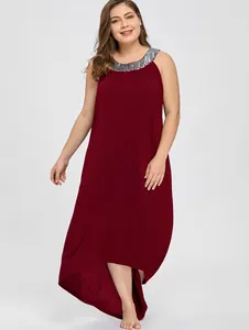 Detail showing burgundy plus size dress with sequined neckline and high-low hem.