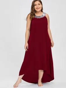 Detailed view of burgundy plus size dress featuring a sequined halter neckline