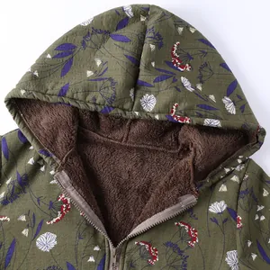 Close-up detail of floral print padded jacket with warm brown fleece lining and zipper