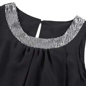 Close-up detail of the silver sequin neckline on a black sleeveless chiffon dress.