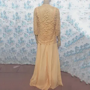 Back view of elegant peach two-piece lace cardigan and chiffon maxi dress set.