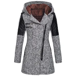 Detailed view of grey wool blend hooded coat with asymmetrical zipper and quilted sleeves.