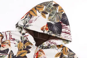 Detail of leaf print hooded jacket with warm fleece lining and button closure